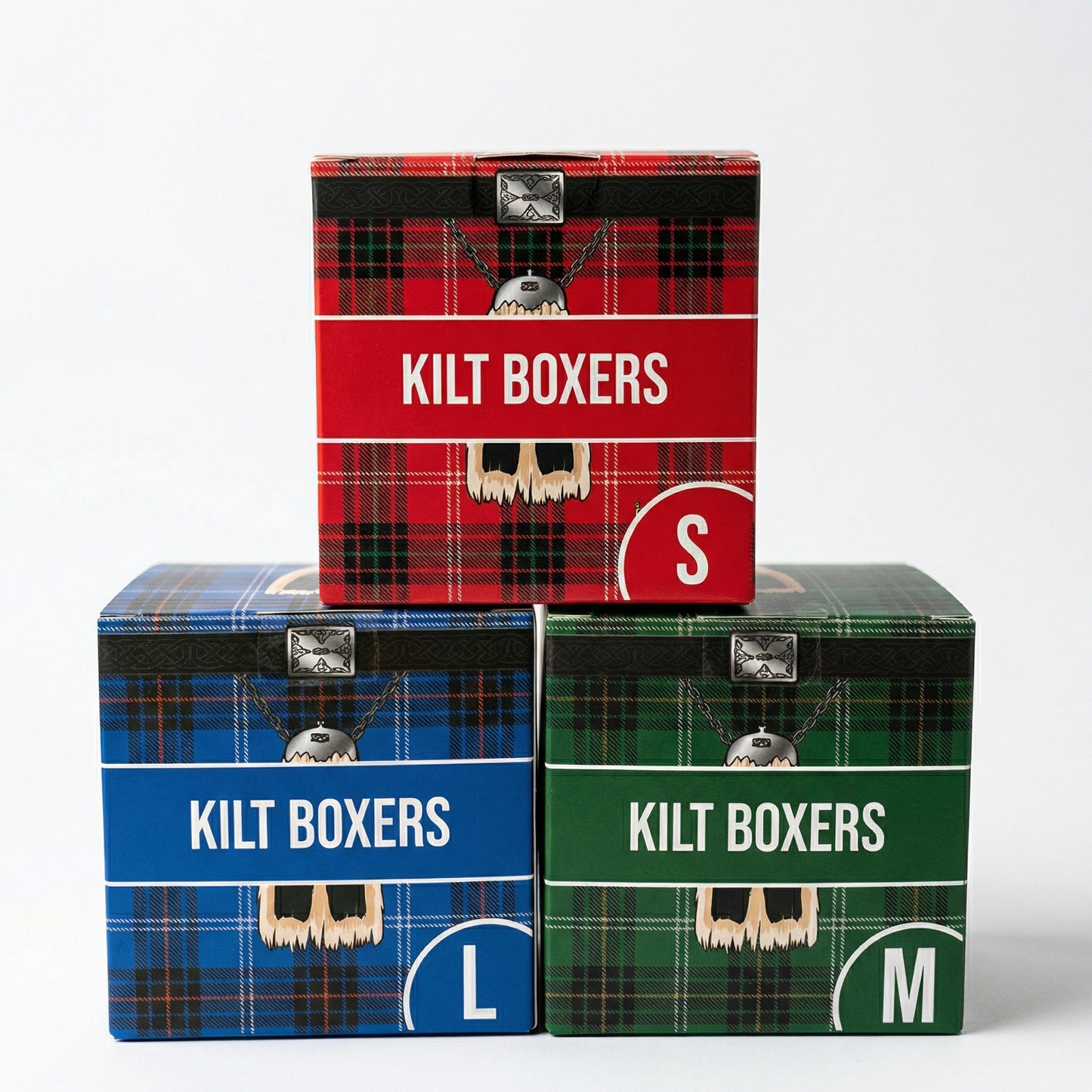 Three boxes labeled 'Kilt Boxers' in red, blue, and green tartan patterns on a white background.