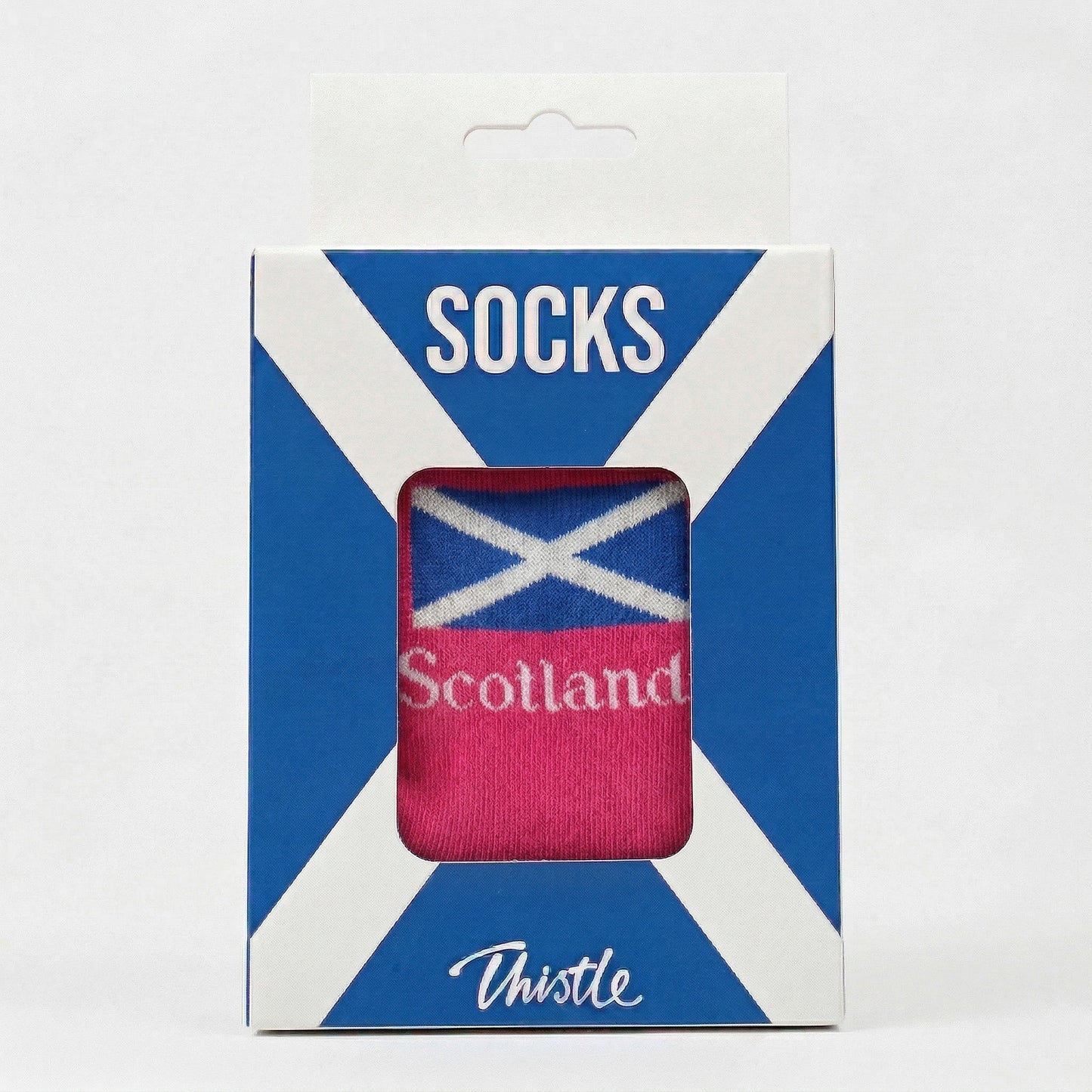 Packaged socks with Scottish flag design on a white background