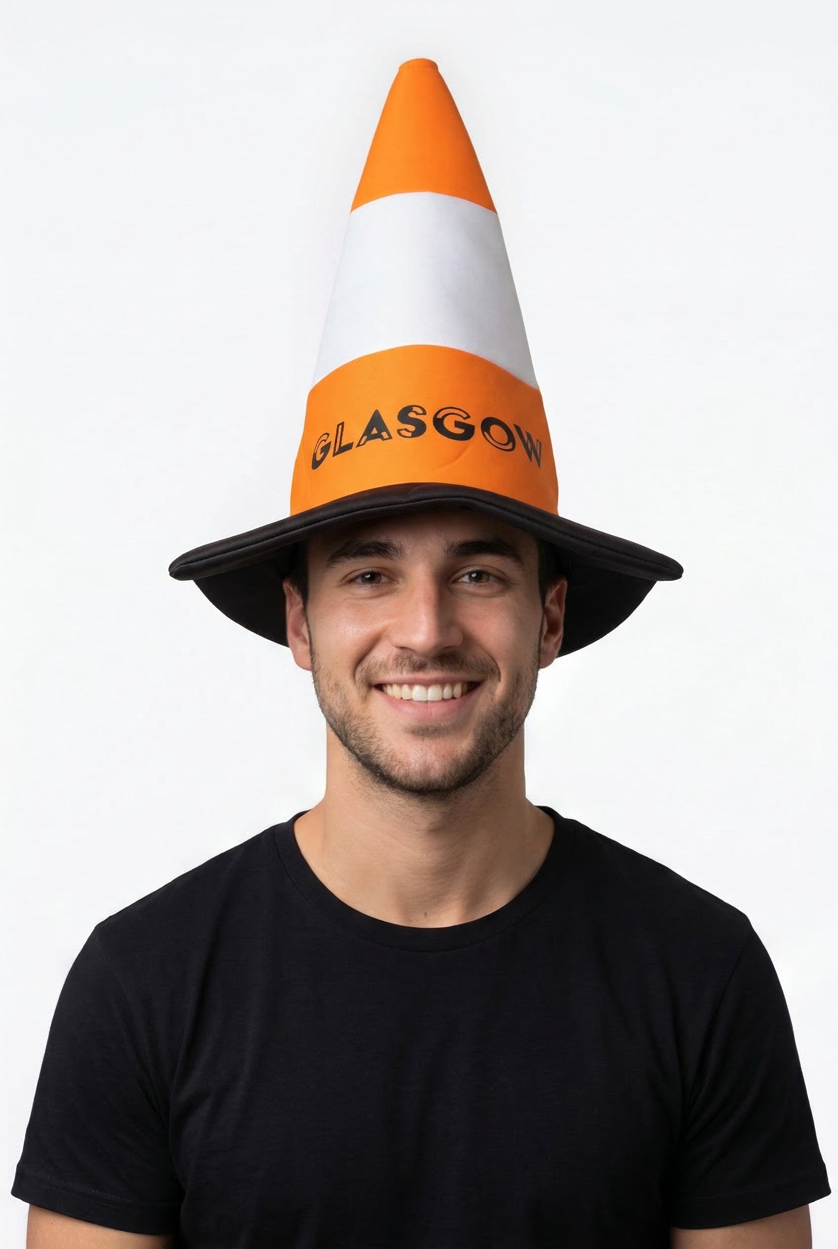 Person wearing a novelty hat shaped like a traffic cone with 'Glasgow' text on a white background