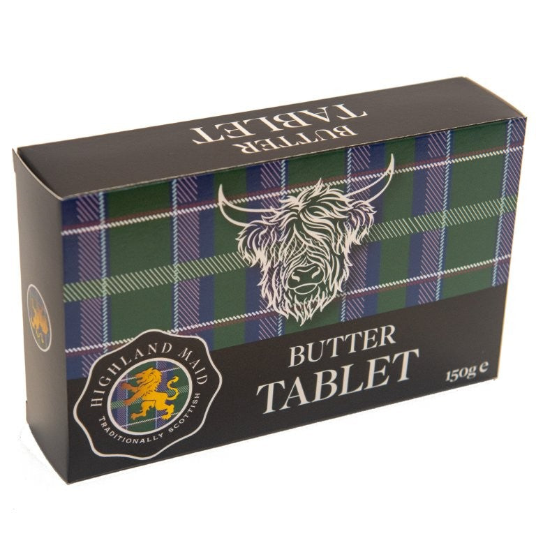 Butter tablet packaging with plaid design and Highland cow illustration on a white background