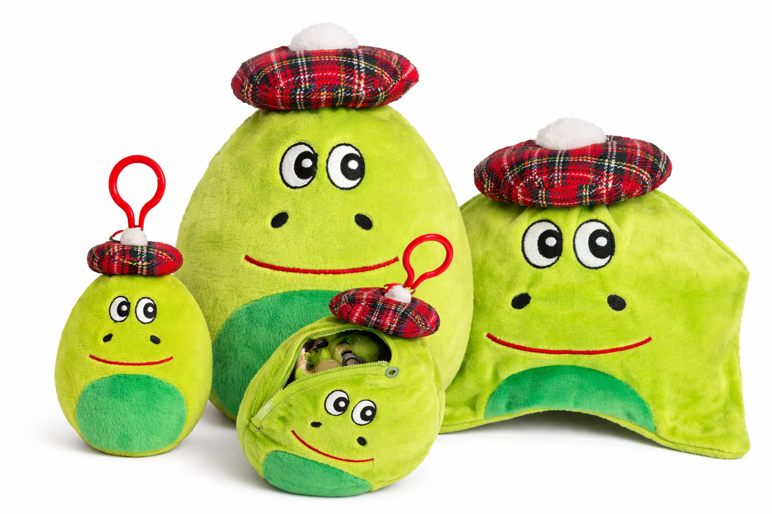 Set of four green plush nessie soft toys with tartan hats on a white background.