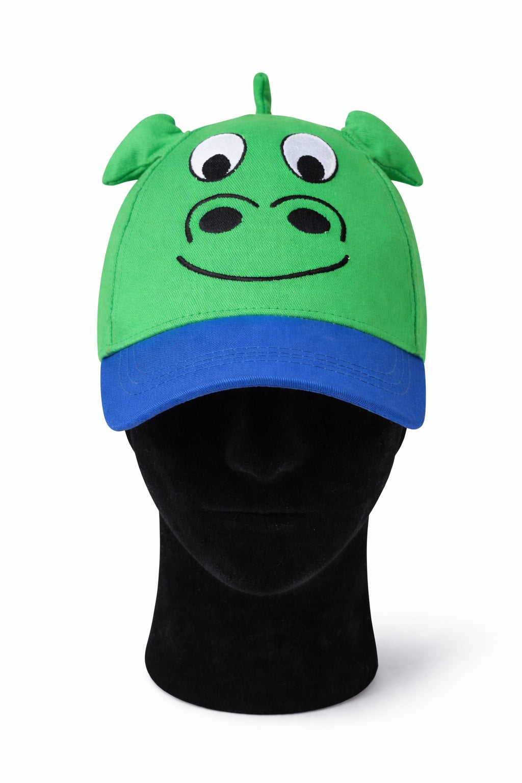 Green and blue cap with nessie design on a black mannequin head against a white background.