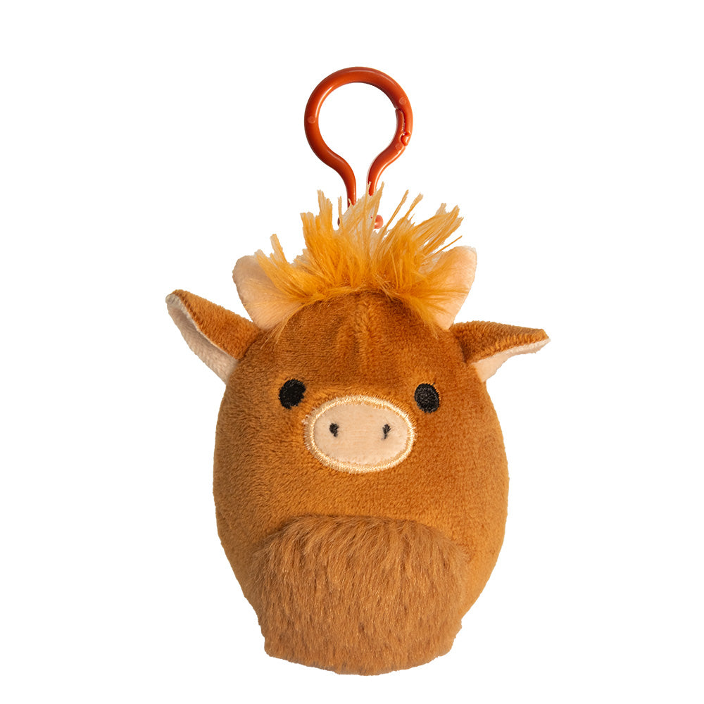 Plush keychain with a brown highland cow design on a white background