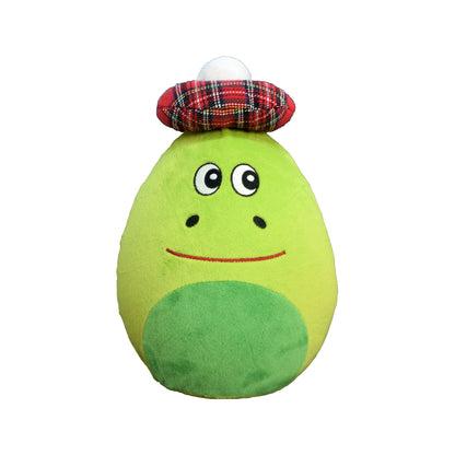 Green plush nessie soft toy with a red tartan hat on a white background.