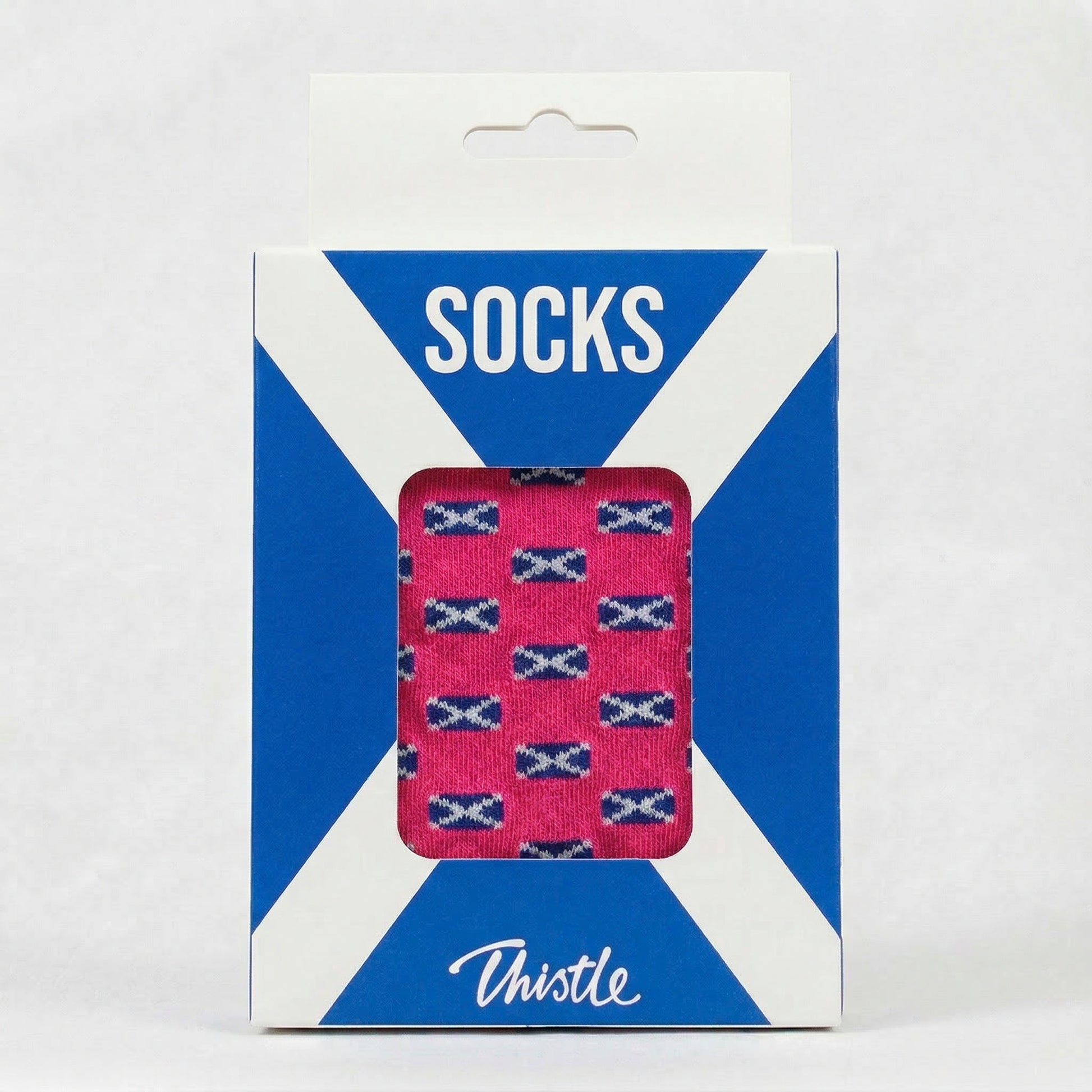 Packaged socks with Scottish flag pattern on a blue and white striped background