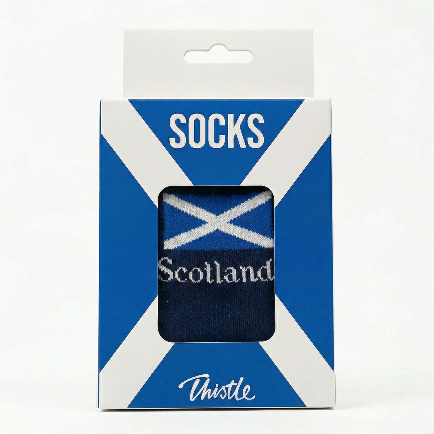 Packaged socks with Scottish flag design on a white background