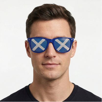Man wearing blue sunglasses with Scottish flag on them.
