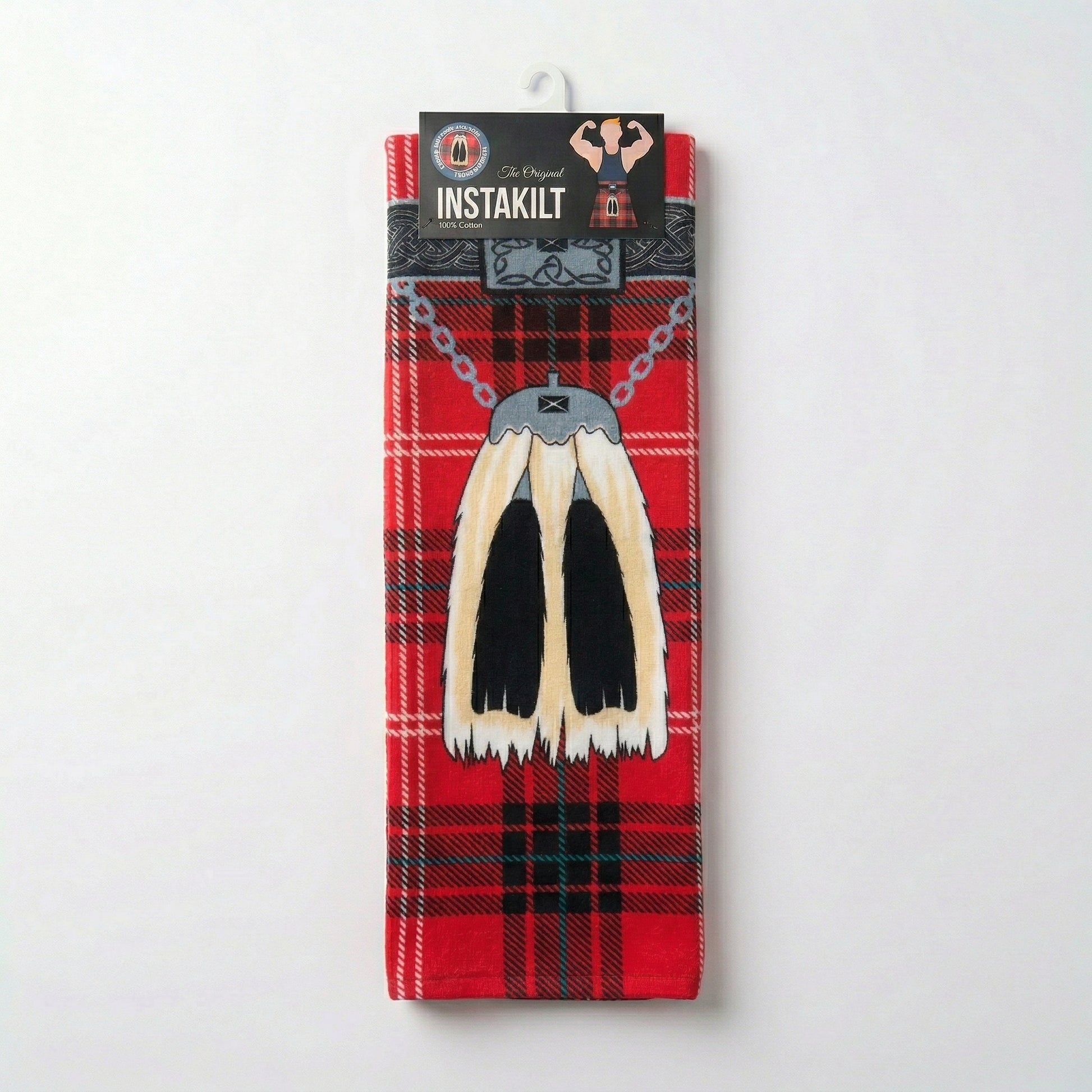 Red tartan kilt towel folded in packaging.