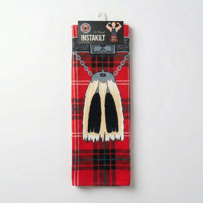 Red tartan kilt towel folded in packaging.