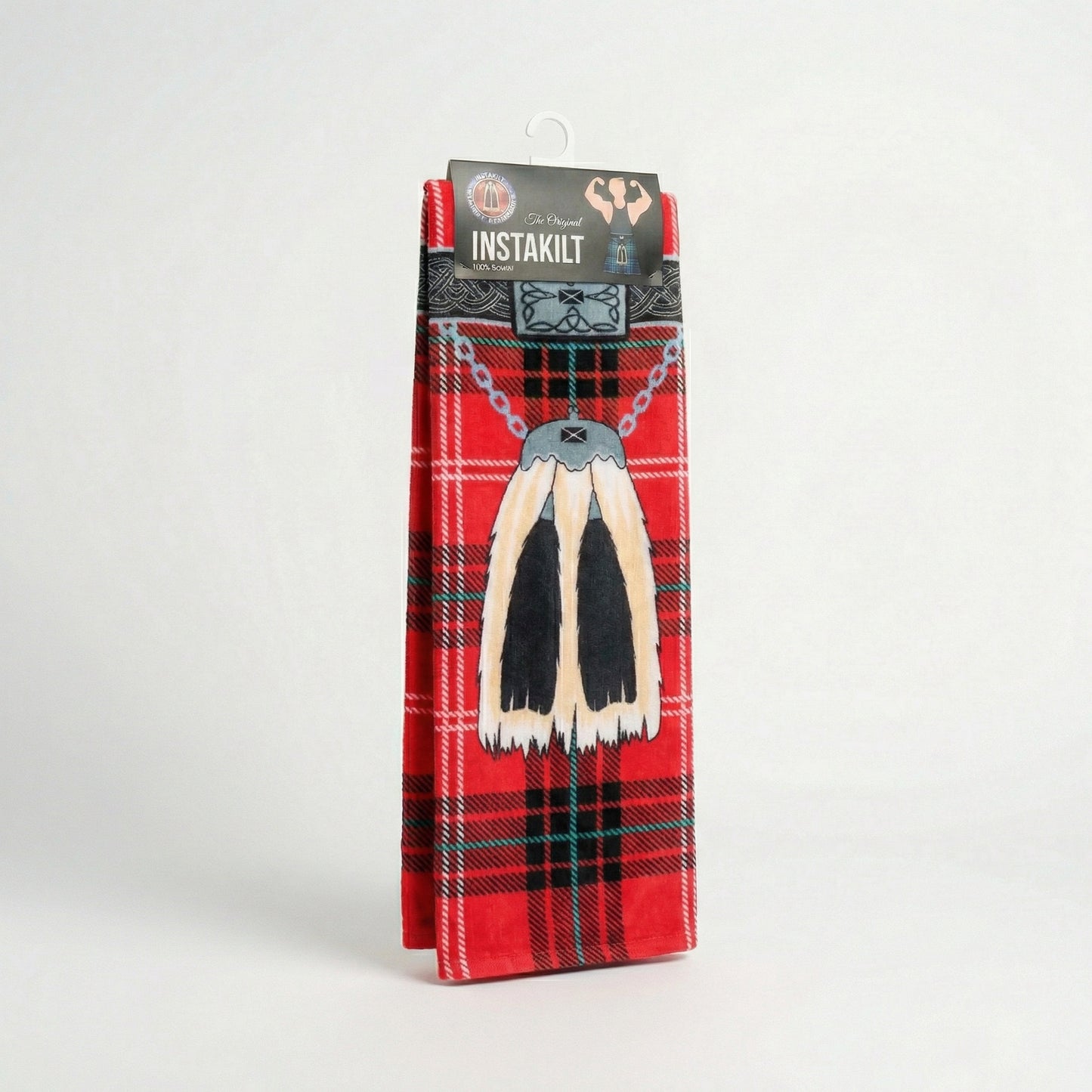 Red tartan kilt beach towel in packaging.