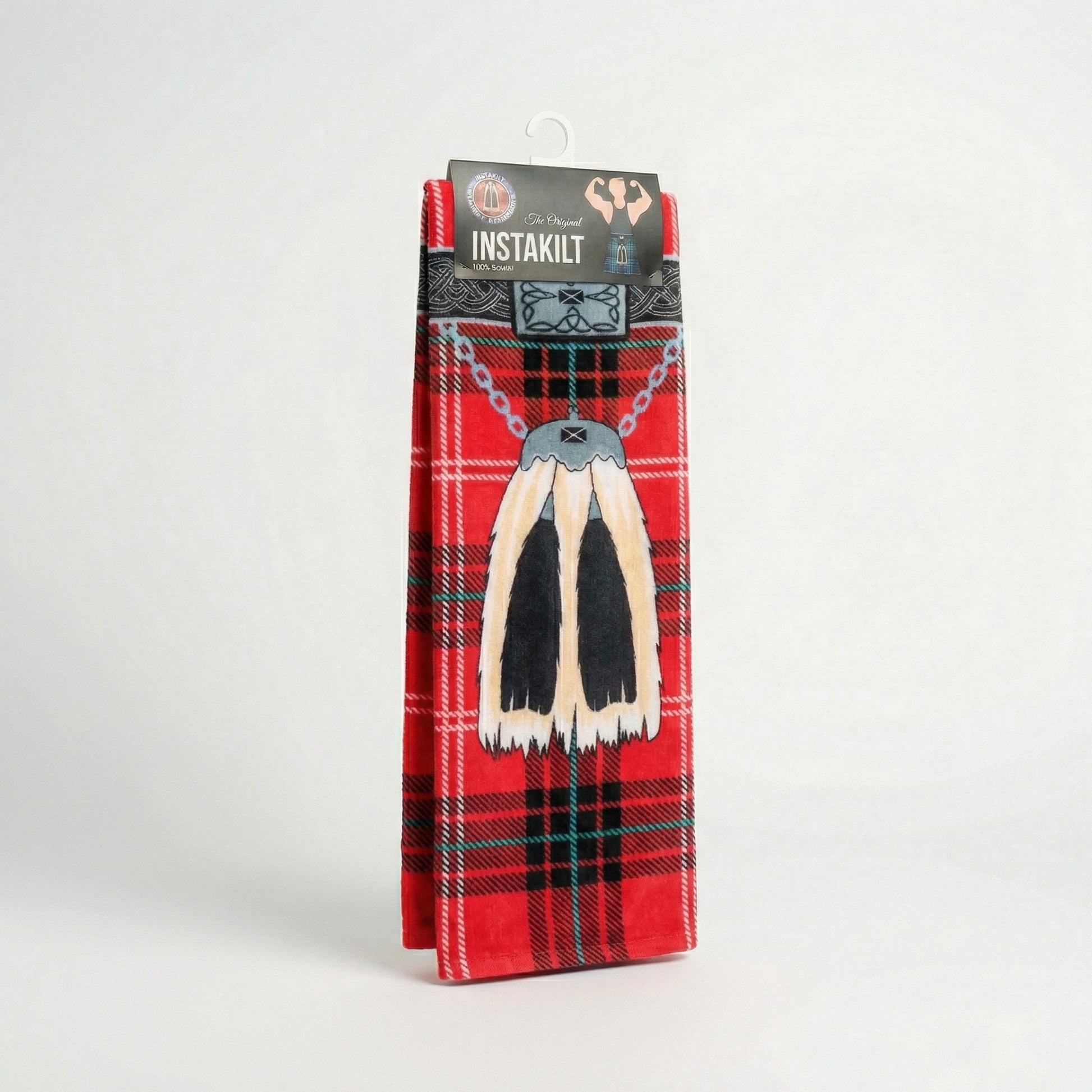 Red tartan kilt beach towel in packaging.