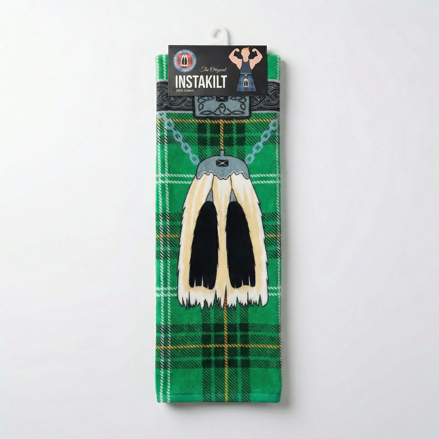 Green kilt beach towel with traditional sporran in packaging, on a white background.