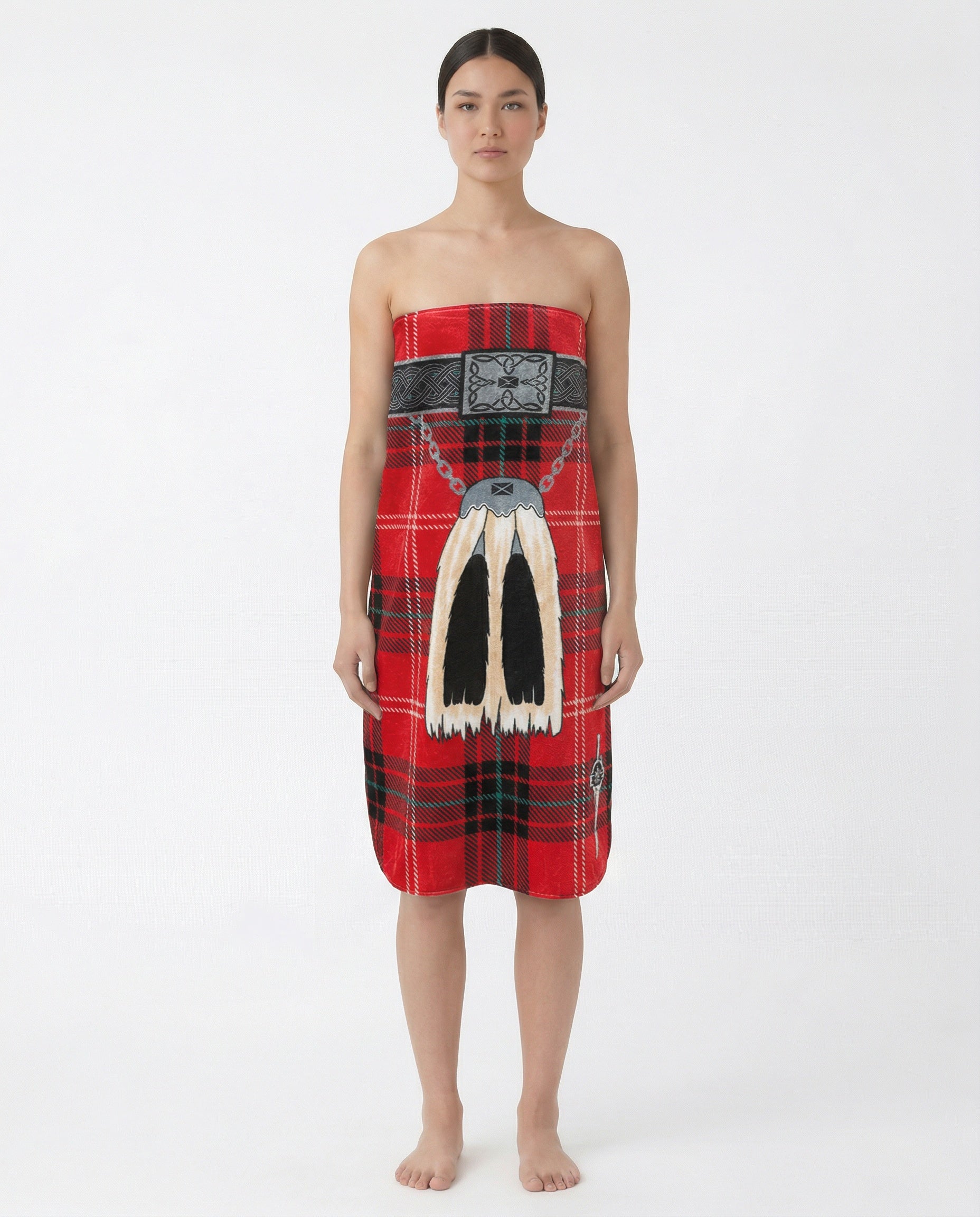 Woman wearing a red tartan towel with traditional sporran on a white background.